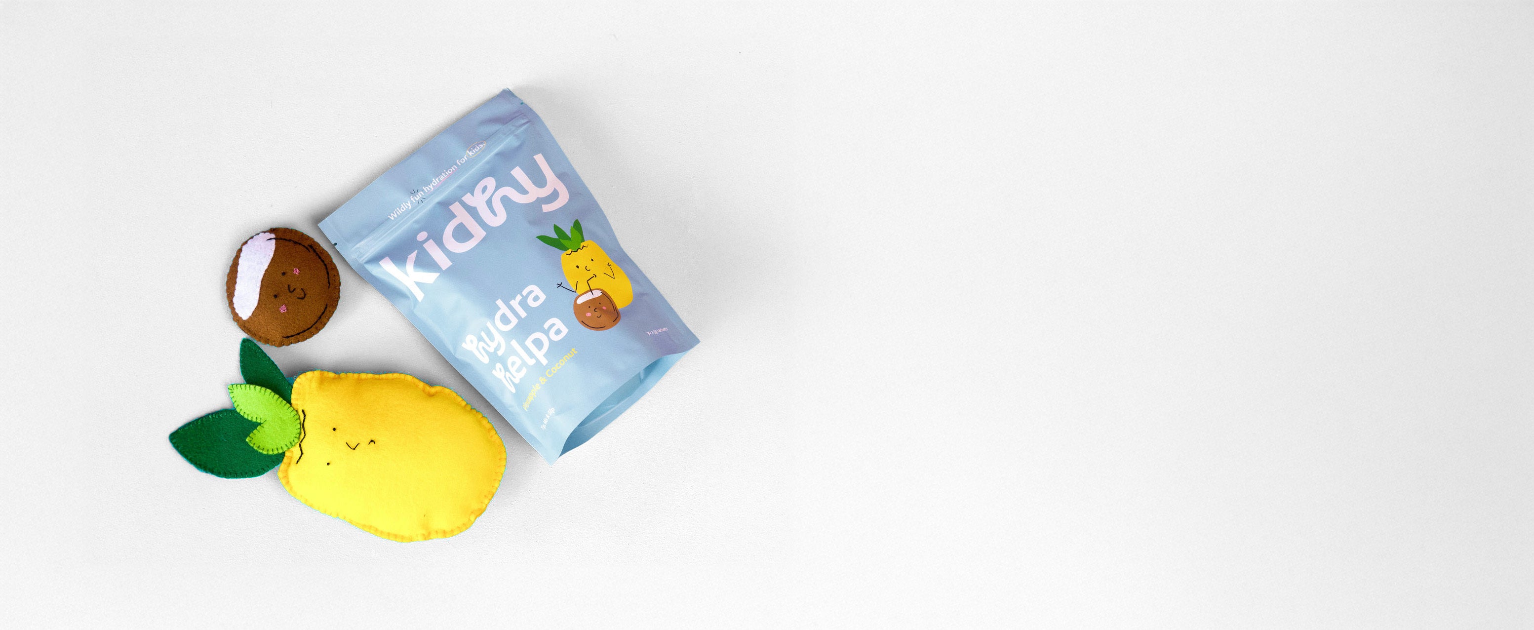 kidhy hydra helpa kids hydration drink packet pineapple and coconut with felt fruit